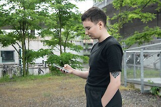 User exploring with Ody-C outside