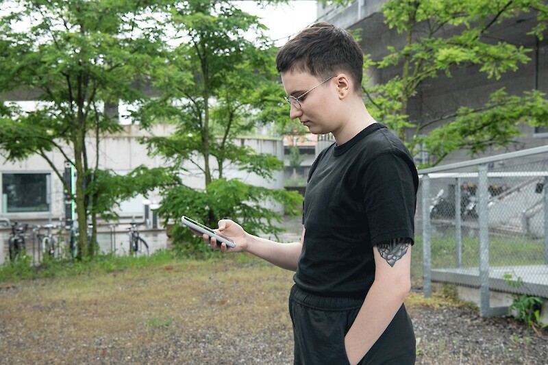 User exploring with Ody-C outside