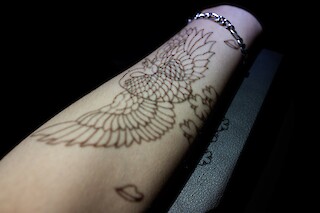 Tattoo projected on an arm